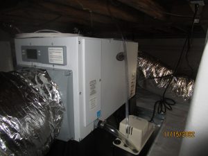 AprilAire dehumidifier system installed in and encapsulated crawlspace installed by Mold & Mildew Solutions, llc to condition the space
