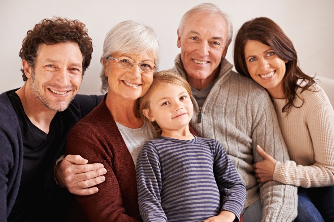 Multi-generational family at home showing need to protect children and elderly from environmental health risks